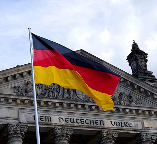 Canva Germany Flag In Front Of Building (2)